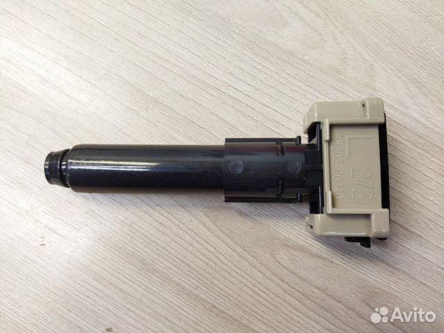 Форсунка омывателя фары передняя левая Toyota Land