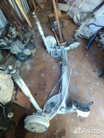 Задняя балка Рено Логан