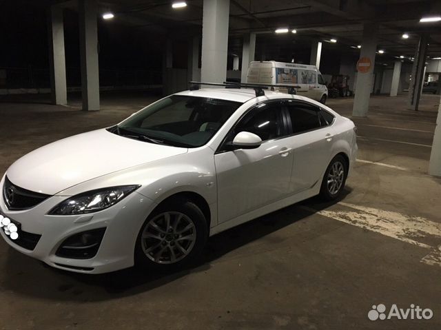 Багажник на крышу автомобиля Thule Mazda, Ford