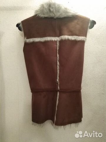 Меховая жилетка
