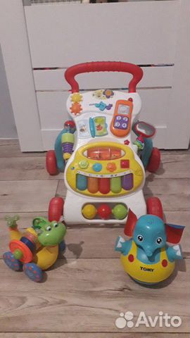 Музыкальные игрушки. Каталка-ходунки Музыкальные игрушки. Каталка-ходунки