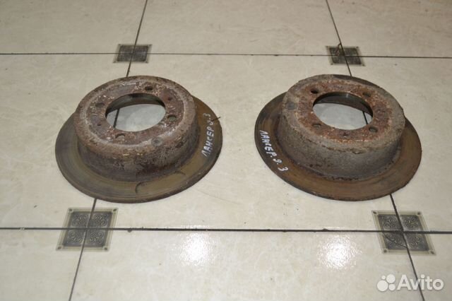 Тормозной диск задний Mitsubishi Lancer 9