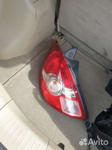 Задний левый фонарь Nissan Tiida C11