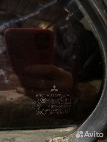 Стекло собачника заднее левое Mitsubishi Lancer