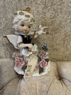 Статуэтки сувенир фарфор новык